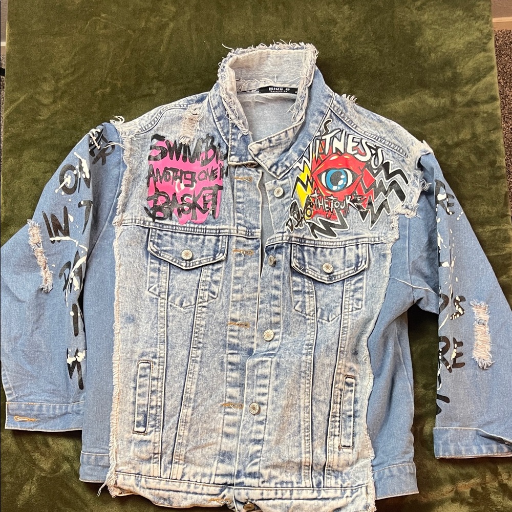 Distressed Denim Jacket with Graphic Patches